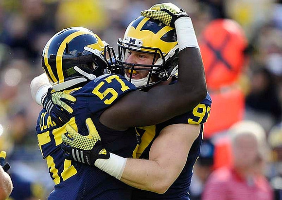 Frank Clark (57) and Brennen Beyer (97)