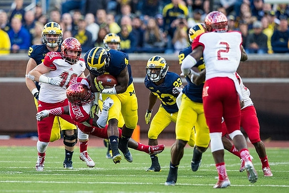 De'Veon Smith (4), Mason Cole (52), Dennis Norfleet (23), and Amara Darboh (82)