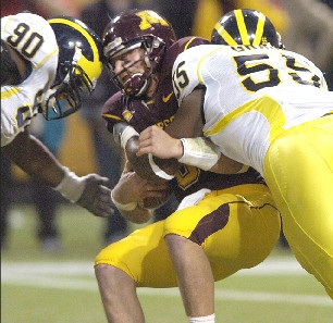 Tim Jamison (90) and Brandon Graham (55)
