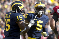 James Ross (15) and Jabrill Peppers (5)