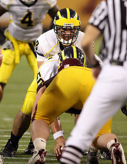 Nick Sheridan (8), David Molk (50), and Brandon Minor (4)