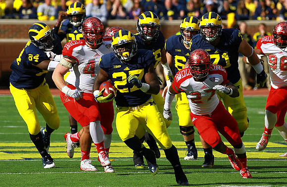 Derrick Green (27) and A.J. Williams (84)