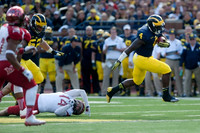De'Veon Smith (4) and Mason Cole (52)