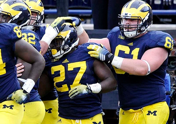 Derrick Green (27), A.J. Williams (84), Amara Darboh (82), and Graham Glasgow (61)