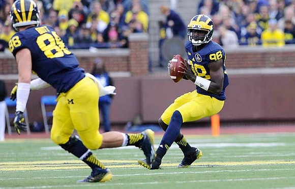 Jake Butt (88) and Devin Gardner (98)