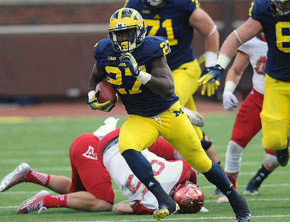 Derrick Green (27) and  Ben Braden (71)