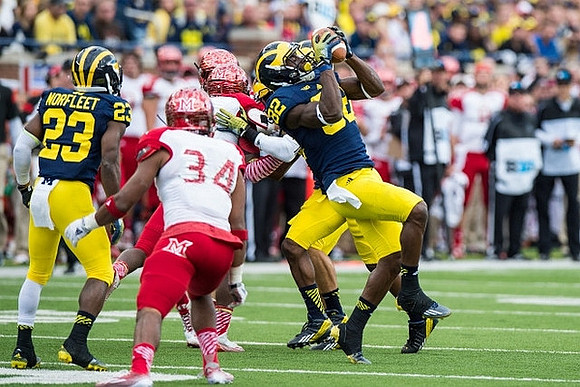 Dennis Norfleet (23) and Amara Darboh (82)
