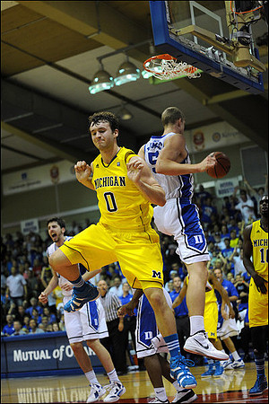 Zack Novak (0) and Tim Hardaway Jr. (10)