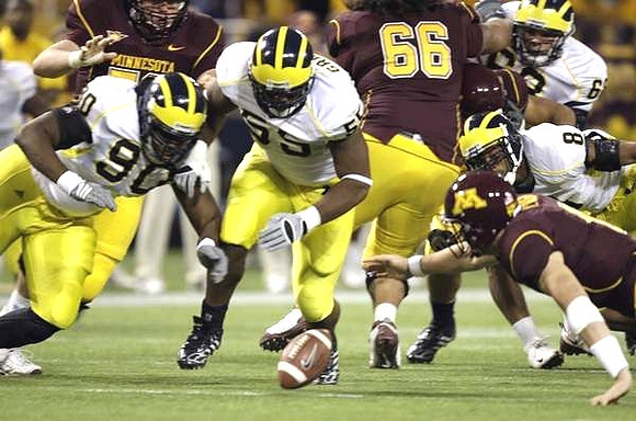 Tim Jamison (90), Brandon Graham (55), Jonas Mouton (8), and Mike Martin (68)
