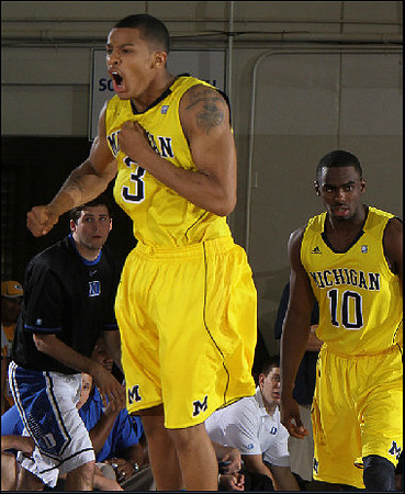 Trey Burke (3) and Tim Hardaway Jr. (10)