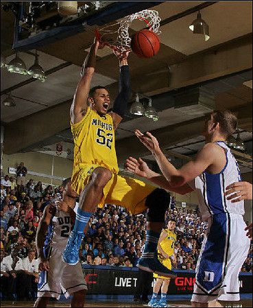 Jordan Morgan (52) and Zack Novak (0)
