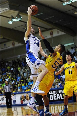 Jordan Morgan (52) and Zack Novak (0)