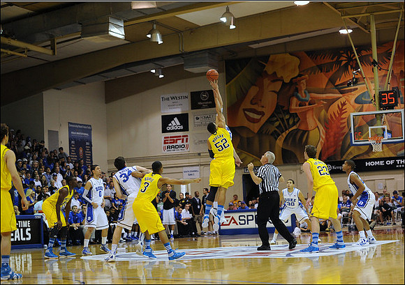 Zack Novak (0), Tim Hardaway Jr. (10), Trey Burke (3), Jordan Morgan (52), and Evan Smotrycz (23)