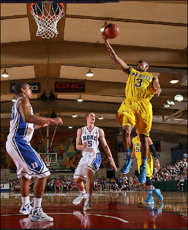 Trey Burke (3) and Jordan Morgan (52)