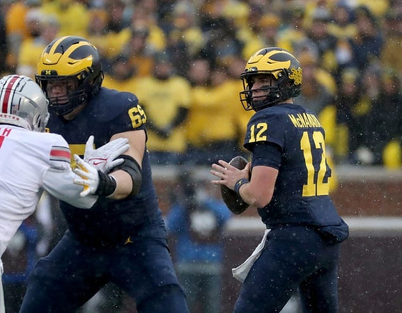 Zak Zinter (65) and Cade McNamara (12)