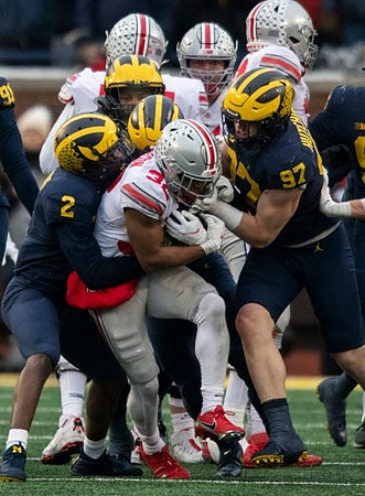 Taylor Upshaw (91), Brad Hawkins (2), and Aidan Hutchinson (97)