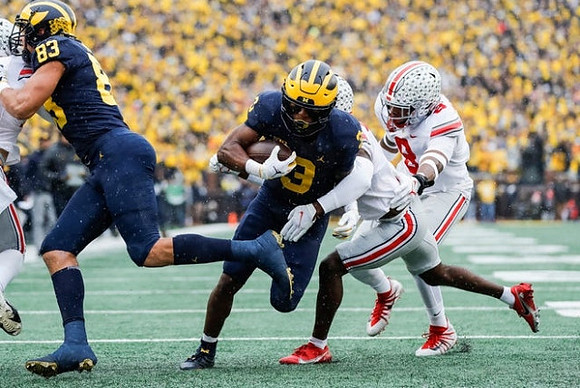 Erick All (83) and A.J. Henning (3)