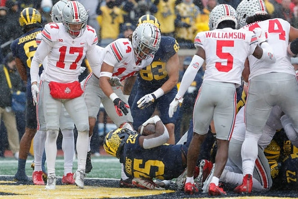 Cornelius Johnson (6), Hassan Haskins (25), and Erick All (83)