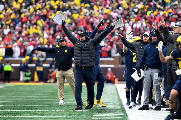 Mike Hart, Jim Harbaugh, and Jay Harbaugh