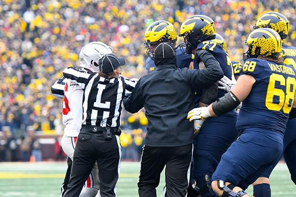 Trevor Keegan (77), Hassan Haskins (25), Andrew Vastardis (68), and Luke Schoonmaker (86)
