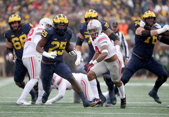Andrew Vastardis (68), Hassan Haskins (25), Trevor Keegan (77), and Ryan Hayes (76)