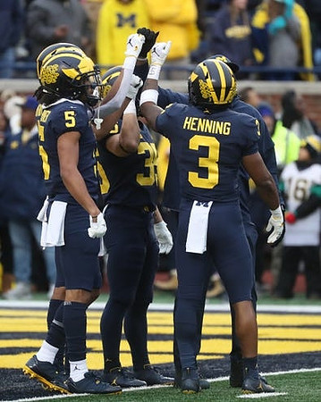 DJ Turner (5), Caden Kolesar (35), and A.J. Henning (3)