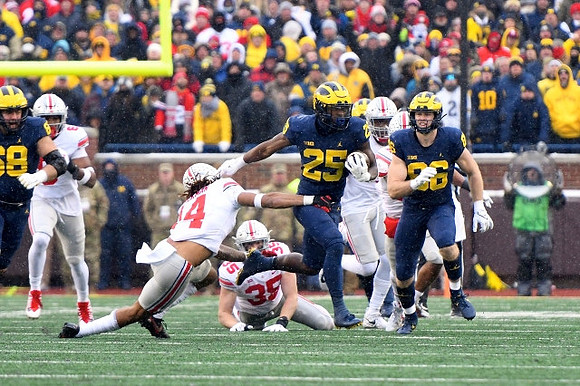 Andrew Vastardis (68), Hassan Haskins (25), and Luke Schoonmaker (86)