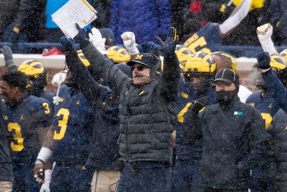A.J. Henning (3), Jordan Whittley (3), and Jim Harbaugh