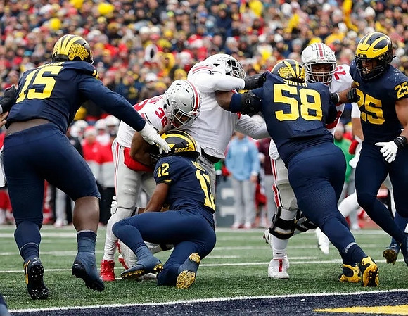 Christopher Hinton (15), Josh Ross (12), Mazi Smith (58), and Junior Colson (25)