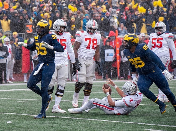 David Ojabo (55) and Donovan Jeter (95)