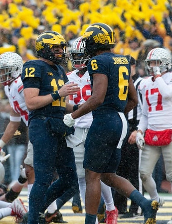 Cade McNamara (12) and Cornelius Johnson (6)