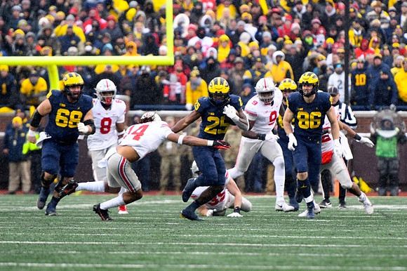 Andrew Vastardis (68), Hassan Haskins (25), and Luke Schoonmaker (86)