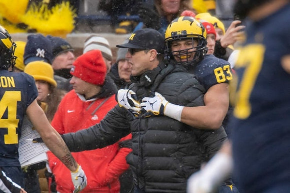 Jim Harbaugh and Erick All (83)