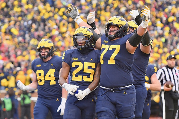 Joel Honigford (84), Hassan Haskins (25), and Trevor Keegan (77)