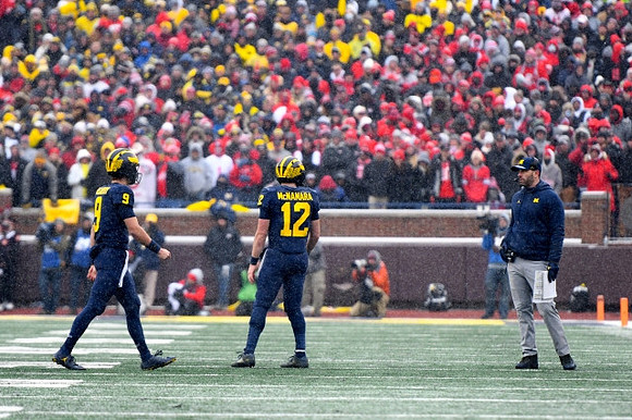 J.J. McCarthy (9) and Cade McNamara (12)