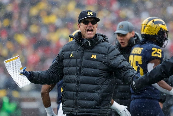 Jim Harbaugh and Hassan Haskins (25)