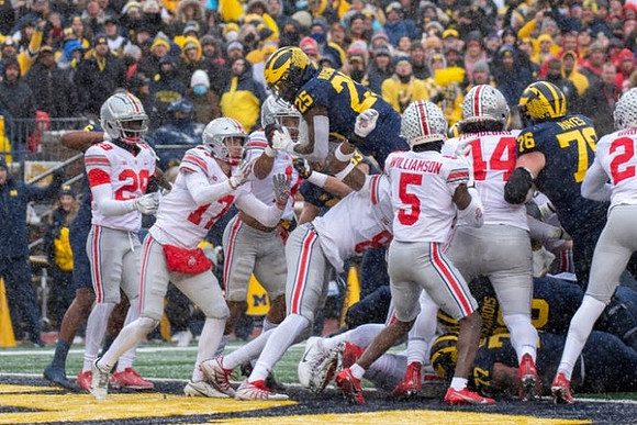 Hassan Haskins (25), Ryan Hayes (76), Trevor Keegan (77), and Andrew Vastardis (68)
