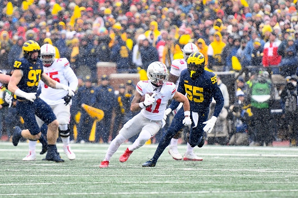 Aidan Hutchinson (97) and David Ojabo (55)