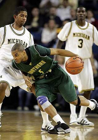 Darius Morris (4) and Manny Harris (3)