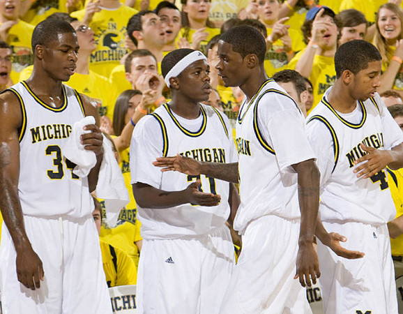 DeShawn Sims (34), Laval Lucas-Perry (31), Manny Harris (3), and Darius Morris (4)