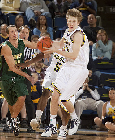 Eso Akunne (5) and Matt Vogrich (13)