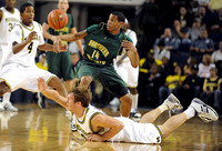 Darius Morris (4) and Zack Novak (0)
