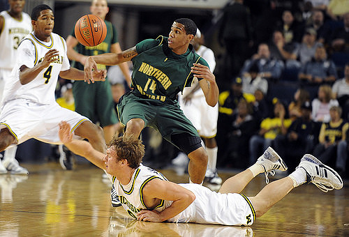 Darius Morris (4) and Zack Novak (0)