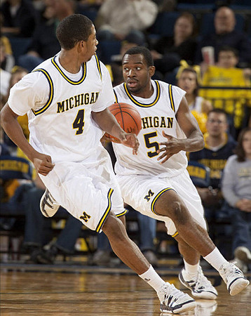Darius Morris (4) and Eso Akunne (5)