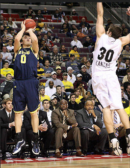 Zack Novak (0), Mike Jackson, and Jerry Dunn