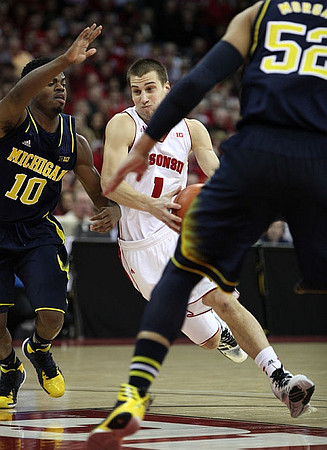 Derrick Walton Jr. (10) and Jordan Morgan (52)