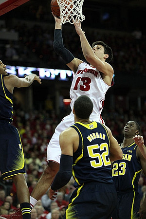 Jordan Morgan (52) and Caris LeVert (23)