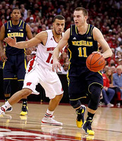 Glenn Robinson III (1) and Nik Stauskas (11)