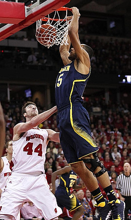 Nik Stauskas (11) and Jon Horford (15)