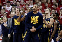 Andrew Dakich (5), Glenn Robinson III (1), Jordan Morgan (52), Max Bielfeldt (44), and Derrick Walton Jr. (10)
